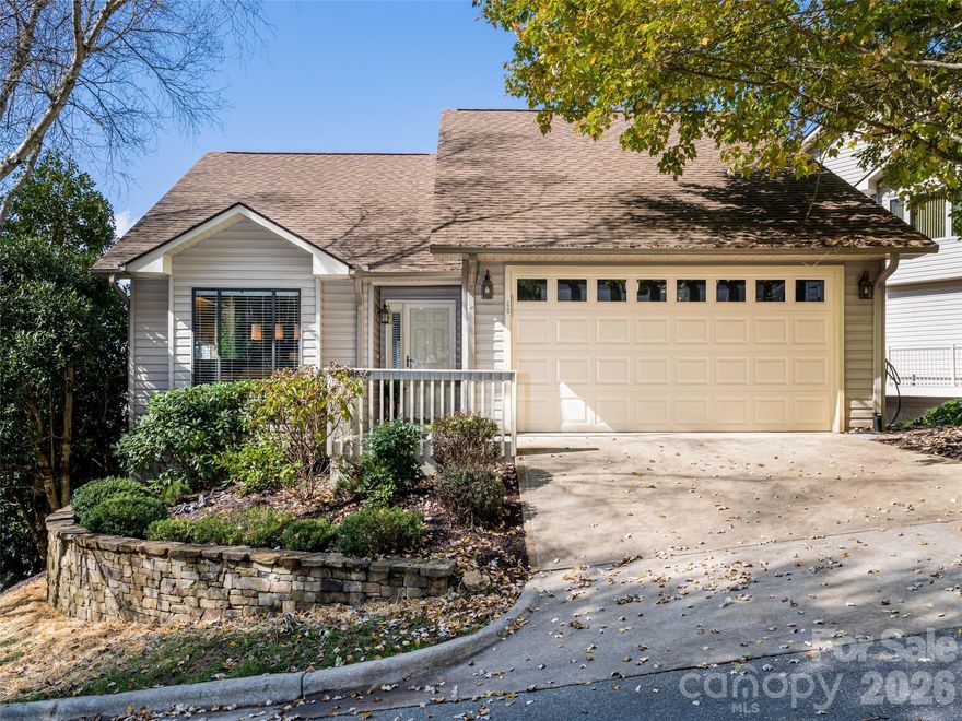 Discover the perfect blend of convenience and breathtaking views in the heart of South Asheville! This open and luminous home is designed to maximize natural light, featuring expansive windows that invite the stunning scenery into your daily life. The living room showcases sweeping mountain views, both near and far and the woods surrounding Givens Estate greet you from the dining area window. The main-level primary suite and garage provide convenience, while the lower-level flex room offers endless possibilities for exercise, storage, or a productive home office. Just down the street, you’ll find access to the serene Givens walking trails, perfect for wooded nature walks. Embrace easy living with the lock-and-go lifestyle offered by the Park Avenue HOA, which includes essential lawn maintenance. With Ingles Market and Whole Foods a mere 1.7 miles away and Biltmore Park Town Square less than 5 miles from your home, everything you need is within reach. Enjoy community amenities including a tennis court with pickleball lines, an outdoor pool, and a charming clubhouse. Owner is a licensed NC RE agent. Showings start 3/6/26.