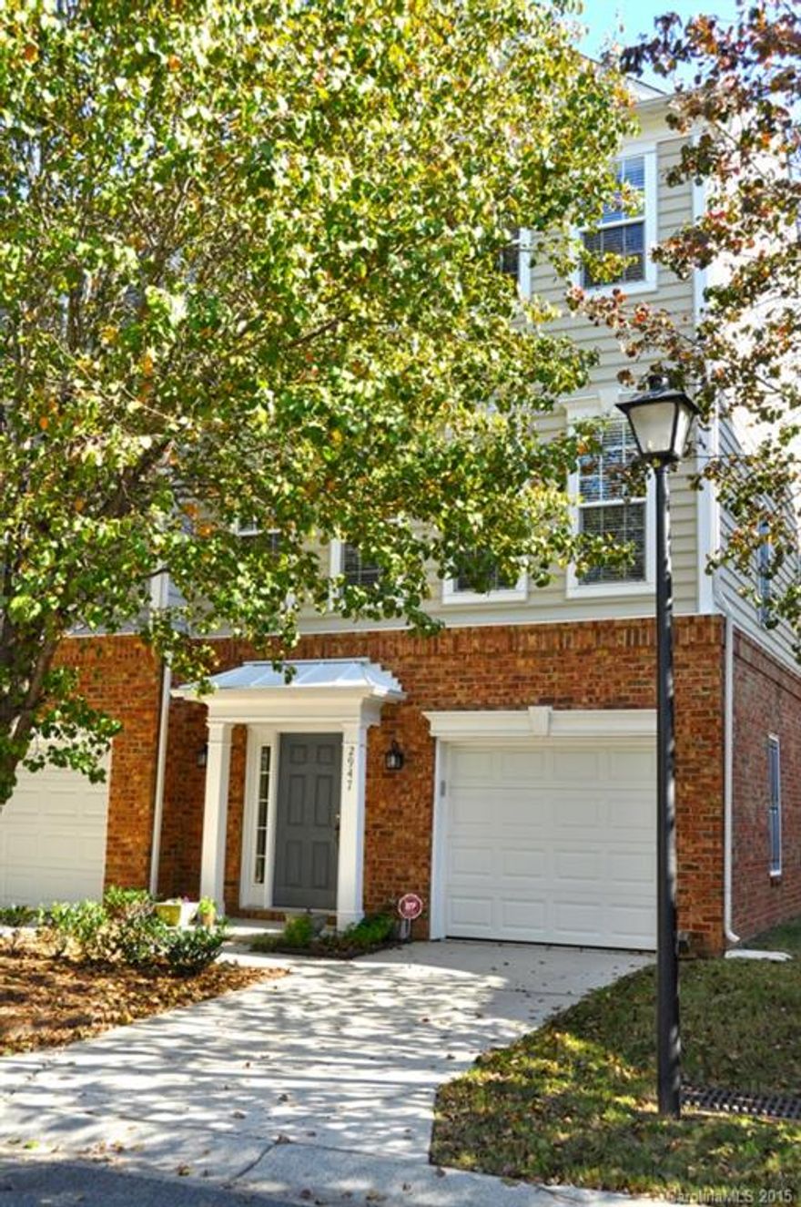 Move-in ready! Enjoy the light and open spaces of this elegant 3-story END-UNIT townhome in premier SouthPark location.  Hardwoods on main and entry levels.  Open kitchen features eating bar and pantry.  Two vaulted masters each with own bath and walk-in closet. Lower level patio plus deck on main.  Flex room on entry level makes excellent guest room or office.  Real wood blinds throughout and completely wired for sound.  Excellent location close to both SouthPark and Park Road Shopping Center