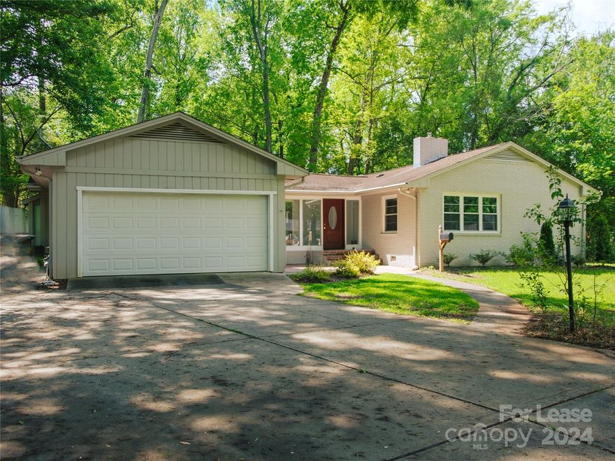 Fantastic Floorplan With Large Open Rooms,  Custom Cabinets, Hardwood Floors Throughout.  You Won't Believe The Space!   The Huge Greatroom Has a Cathedral Ceiling & Large Windows Looking Out Over The Huge Private Rear Yard.  The Living Room & Dining Area Features Another Fireplace & Walls of Windows.    Both Are Extremely Versitile & Can Also Work As A Playroom or Home Office.  The Large Master Bedroom Has a Vaulted Ceiling,  Plenty of Closets and Complete Privacy.  The Custom Kitchen Has Cabinets Galore With Beautiful Granite Countertops and Recessed Lights.  The Breakfast Area Is Large Enough For Most Diining Tables.  The Other 3 Bedrooms Are Large & Have Great Closets.  I Love This Floorplan