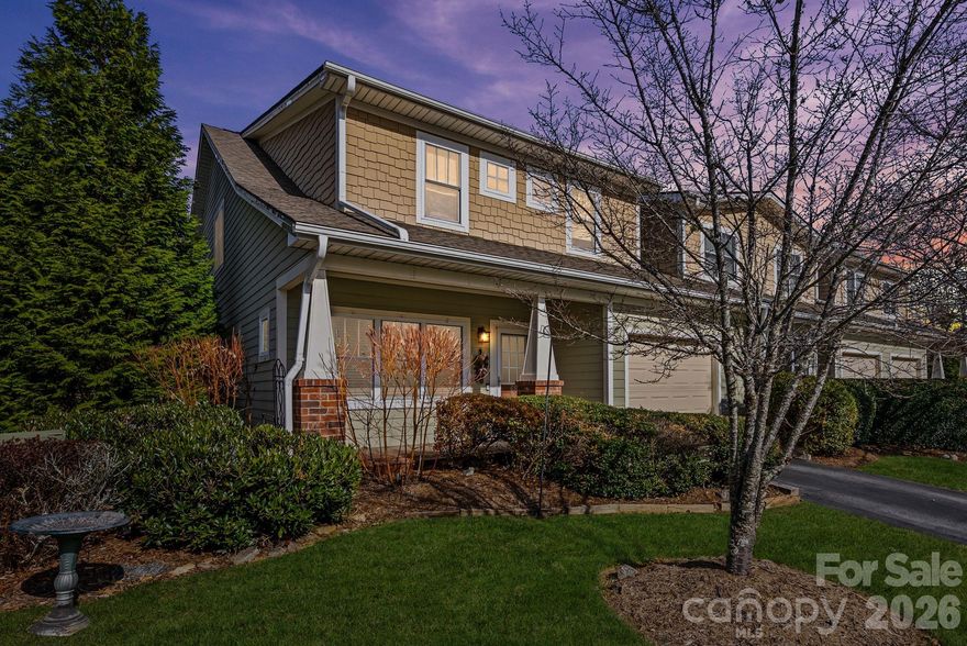 Welcome to easy living in the sought-after Fox Glen community in Fletcher. This end-unit townhome offers rare privacy, a garage, and a primary suite on the main level complete with a walk-in closet and en suite bathroom.

Inside, enjoy a large, open living space that flows into a functional, well-appointed kitchen. Step outside to your side patio right off the dining space, ideal for all your grilling needs.

Upstairs, you'll find two generously sized bedrooms, a full bathroom, and a spacious loft area offering the perfect flex space for a home office, playroom, or additional lounge. With abundant storage throughout, staying organized is effortless.

Residents of Fox Glen enjoy amenities including a heated outdoor pool, fitness center, and playground. All located minutes to Fletcher Park, shopping, dining, and easy access to both Asheville and Hendersonville.

Low-maintenance living, incredible community perks with a low HOA fee, and a versatile floor plan; this townhome truly checks all the boxes.