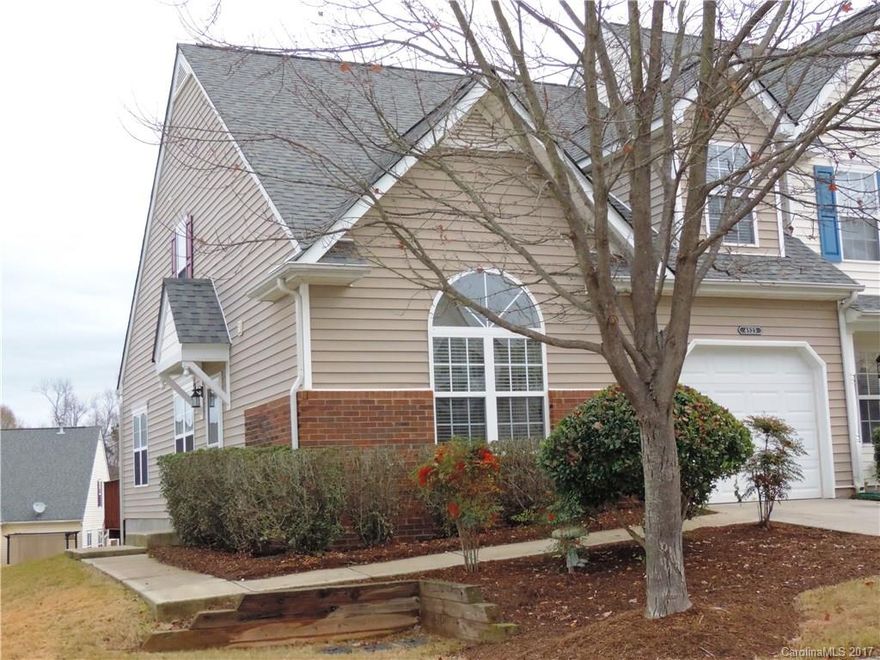 Immaculate and Spacious home within minutes to the Ballantyne area! End Unit filled with sunshine! Enjoy the outdoor on the New 10x13 deck  that backs up to a common area. Gleaming hardwoods (2017), & all lighting fixtures have also been updated. Open Kitchen w,Granite Countertop, tile backsplash, SS appliances & breakfast bar. Master on Main. Big Loft overlooks the vaulted Great Room. Secondary Bdr & Full Bath on Upper Flr is perfect for roommate situation. New AC unit 2016.