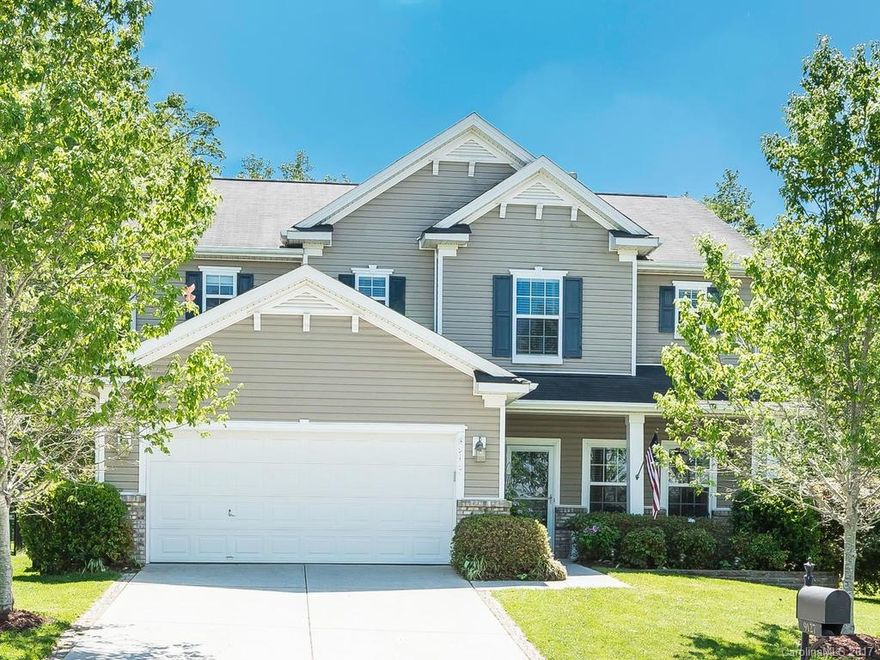 Move-in ready home in highly desirable Berewick Community. Spectacular two story home with open floor plan and wood flooring throughout the main floor. Enjoy the covered front porch or the expansive fenced back yard with the privacy of mature hardwoods to the rear of the home. Oversized master suite, separate shower & garden tub. Large laundry / mud room. Multi-purpose bonus room /office. Great neighborhood amenities – sidewalks, pool, fitness, trails, & much more! Won’t last long.