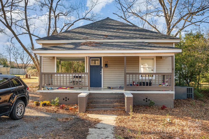 Prime investment opportunity in Rock Hill! This unique property features two fully renovated single-family homes on the same parcel, both fully leased and income-producing. Ideal for investors looking to expand their residential rental portfolio, this property offers strong rental potential with modern updates throughout. The front home, 219 Wall Street, is a beautifully updated 1,065 sq ft 2 BD, 1 BA residence with a studio-style living room/kitchen combo, recently updated appliances, roof, and HVAC. Enjoy outdoor living with a spacious covered front porch and a new back deck. The second home, 219.5 Wall Street, is a 700+ sq ft 1 BD, 1 BA unit featuring a studio kitchen/living space and a fenced backyard. Additional perks include a 100 sq ft storage shed, a covered front porch, and a privacy fence. With stable rental income and modern upgrades, this turn-key property is a fantastic addition to any investment portfolio. Don't miss out on this exceptional opportunity!