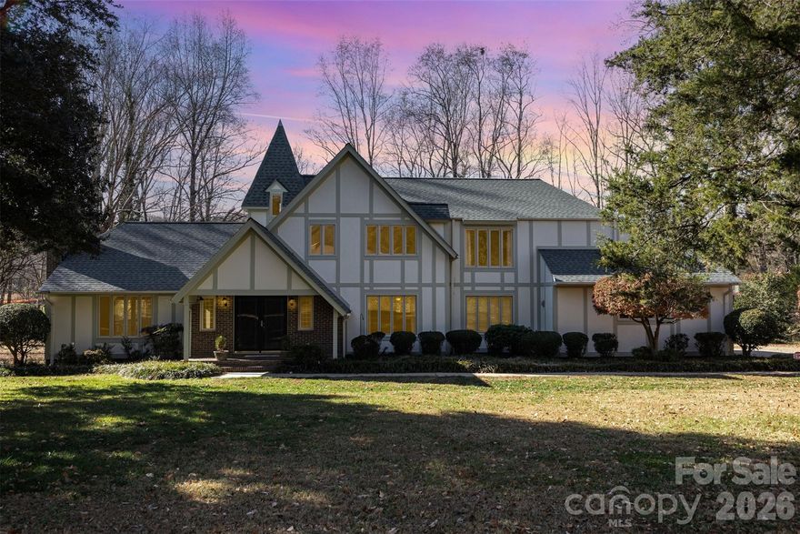 FRESH PAINT means a BLANK SLATE! Make this beautiful home in sought-after Country Club Gardens your own!  This timeless, traditional home sits back from the road on a large ~1 acre lot with a creek! Enjoy peaceful living just minutes to Uptown Shelby, Cleveland Country Club, and Hwy 74 businesses! Main level has great flow with large doorways connecting the common areas. Spacious family room with gas log fire place connects to large dining room. There is also a separate den or home office that has two separate doorways. A covered porch off of the dining room will become one of your favorite places, and this leads to a deck overlooking the creek, neighboring pond, and back yard. The spacious kitchen has granite countertops and stainless steel appliances. There is a center island and a breakfast area w/ additional breakfast bar and tons of cabinet space. A spacious laundry closet is located in the heart of the home making chores convenient!  The main level also has a full bathroom and bedroom with direct exterior access to a 2nd covered back porch--this would be a perfect 2nd living quarters for extended family or guests. Upstairs, you will find a large primary bedroom with en-suite bath and separate dressing room/closet area. There are two additional bedrooms that share a hall bathroom. An upstairs bonus room provides an additional common area or could be a separate home office. Attached two car garage and additional great storage options throughout the house! Updates include neutral interior paint, popcorn ceiling removal, replacement of carpet w/ hardwood floors, and new upstairs HVAC in 2024. Sewer easement in back yard and small encroachment on driveway side. See docs for details. Please call now for more information!!!