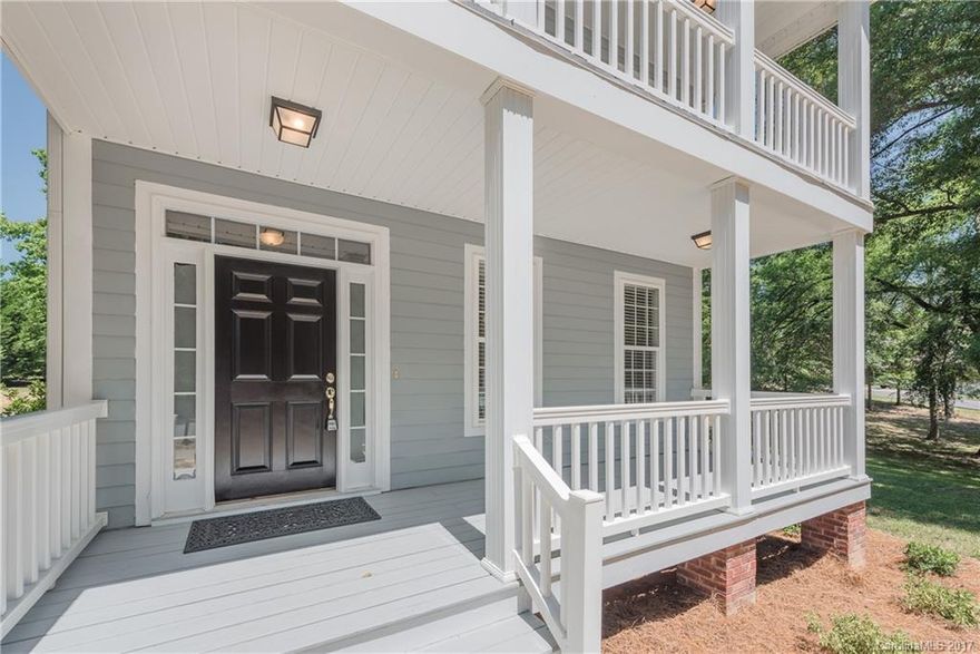 614 Pondway Downs, Rock Hill, SC.  Welcome to this 2 Story Charleston Style Home w/Balcony perched on a fabulous lot w/Est. Trees & HUGE Detached 2 Story Double Garage This 3 BR, 2.5 Ba Cottage offers an Open Floor Plan w/True Hardwood Flooring, Fresh Paint, & New Carpet.  The Spacious Eat in Kitchen comes w/Stainless Appliances, & Cabinetry galore. Use the Flex space, w/Detailed Trim work, for a Home Office, Piano Room, or Formal Living. Cute as can Be and waiting for you!