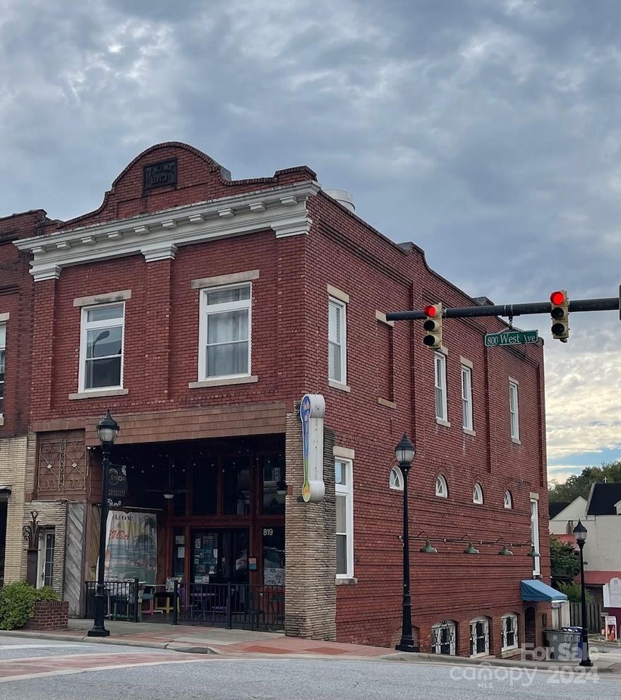 Located in the foothills of the Blue Ridge mountains, this charming turn of the century building is ready for new owners. Originally a sporting goods and Men's store, remodeling and renovations were completed in 2022.  The Street level houses a restaurant, but the possibilities for new ventures are endless! Small town hospitality emanates from this building!  The street level has restaurant seating in and out with dance/entertainment areas, the upper floor is currently used for private parties and banquets with a wonderful fireplace and an apartment/ office area. The Lower level is comprised of the kitchen and bar with room for dining as well. Equipped with 5 restrooms and a full bath/ bed area which afford convenience for any type of business.  Owner willing to negotiate equipment in kitchen and bar area by subtracting items out of final price. There are several avenues this property could be used for, making it  unique. Open to questions and offers! Let us work with your timetable.