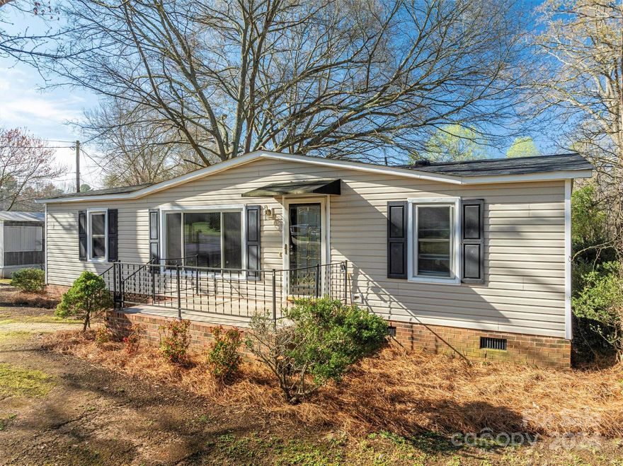 If you are looking for an affordable home in Belmont with over an acre of land and NO HOA, Look no further.  This opportunity does not come along often! This beautiful ranch-style double wide manufactured home is on 1.26 acres in beautiful Belmont, NC. The home has 3 bed 2 bath and is ready to be called yours. A covered deck in the serene back yard and two storage buildings on property are a great bonus.  This property has so much to offer its future owner. Don"t let it slip away.