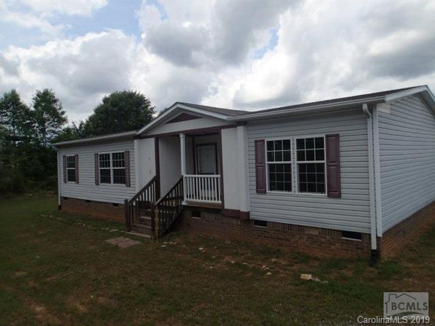 Case# 381-804310.FHA Insured Escrow Financing Available.Purchase this home for ALMOST NO MONEY DOWN!!See your agent for details.Very affordable living in this 3 bedroom 2 bath manufactured home outside Morganton NC. The floorplan includes and open concept living/dining/kitchen with dishwasher and frige already in place, a chefs island, lots of cabinets for storage, and laundy room just off to the right. An oversized master suite w private bathroom is on one side of home, with 2 abbt bedrooms and 2nd full bath on the other. The exterior is low maint vinyl and boasts a rear deck, along with a covered stoop at front entrance. From the rear you have a beautiful view of the mountain ridgeline. Owning your own home is more affordable than ever! CALL TODAY!!Sold AS-IS/WHERE-IS with ALL FAULTS. buyer or buyers agent to verify all stats