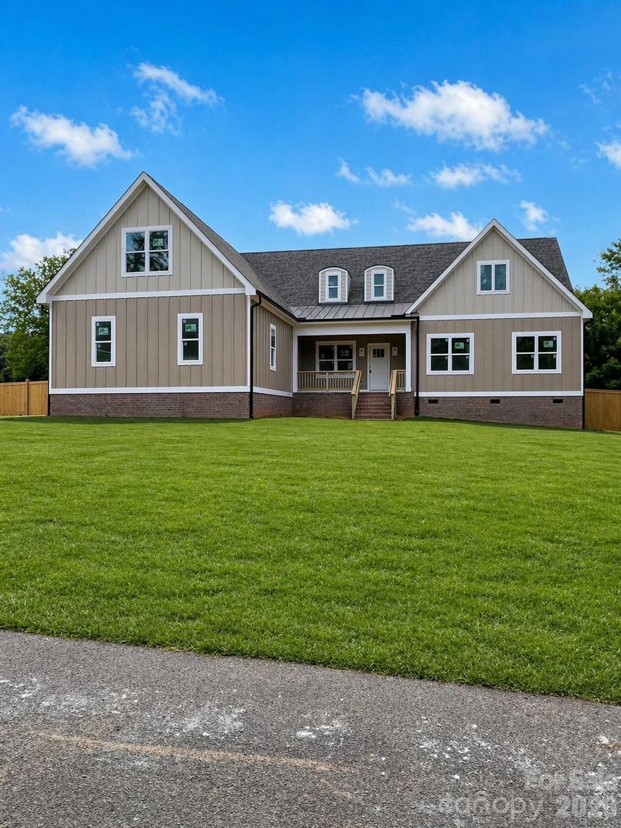 Stunning New Construction Home sits on a peaceful, quiet, fully fenced flat .6 acre lot. No HOA! Step inside to an open floor plan with vaulted ceilings, where the kitchen flows seamlessly into the family and dining rooms—perfect for modern living and entertaining. Featuring 4 bedrooms, 3.5 baths, a bonus room, and a flex room, this home offers both space and versatility. The kitchen boasts luxurious soft-close cabinetry, brushed nickel hardware, a large island, granite countertops, pull out drawers, under counter lighting and stainless steel appliances. The spacious primary suite is located on main level and includes a tray ceiling, ceiling fan, and a large walk-in closet with built-ins. The primary bath features dual sinks with granite countertops and a beautifully tiled shower with a frameless glass door. Upstairs, you’ll find an expansive bonus room with a full bath, an additional flex room, and generous walk-in storage attic. The main-level laundry room includes a utility sink for added convenience. Enjoy outdoor living on the covered, screened-in porch, perfect for relaxing or entertaining guests. Garage is equipped with an electric vehicle (EV) charging outlet. House is located just 5 minutes to the City of Monroe and 4 minutes to Treehouse Vineyards. This home offers the perfect blend of privacy and convenience. Truly
a MUST-SEE!