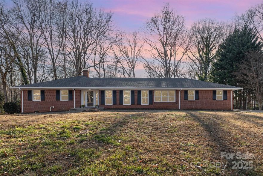 Welcome to this beautifully renovated home at 1210 Brookwood Drive in Shelby, NC, where thoughtful updates and classic craftsmanship come together seamlessly. Offering 4 bedrooms, 3 bathrooms, and approximately 2,900 square feet, this spacious residence has been extensively refreshed from top to bottom, providing peace of mind and modern comfort while maintaining a timeless feel. Inside, you’ll find new laminate flooring, fresh interior paint, updated crown molding (50%), and new interior doors, hardware, hinges, knobs, and stop doors throughout. The home features new light fixtures, ceiling fans with remote controls (4), updated receptacles, A/C return vents, and floor vent covers, along with new smoke and carbon monoxide detectors for added safety. The kitchen has been completely transformed with new cabinets, quartz countertops, backsplash, appliances (refrigerator, range, microwave, dishwasher), garbage disposal, drain kits, and updated fixtures, creating a functional and inviting space for daily living and entertaining. All bathrooms have been fully updated, featuring new vanities, mirrors, vanity lights, tile on floors and walls, toilets with supply lines, faucets, hardware, exhaust fans, and a new bathtub, offering a fresh, spa-like experience. Major system and efficiency improvements include new energy-efficient windows with blinds, new HVAC insulated flex-ducting, cleaning and maintenance of A/C units and furnaces, new crawl space vapor barrier (100%), crawl space insulation (25%), ceiling insulation (20%), and new pull-down attic stairs (10’). Exterior upgrades are just as impressive with a new 20x24 chimney cap, painted gutters and shutters, reconfigured rainwater runoff away from the home, a new exterior laundry door, new exterior door hardware with deadbolts, new exterior electrical outlets, a new mailbox, and a new main doorbell. The new refrigerator will convey. This move-in-ready home offers the space, updates, and durability today’s buyers appreciate all in an established Shelby neighborhood. A rare opportunity to enjoy a truly renovated home with both style and substance.