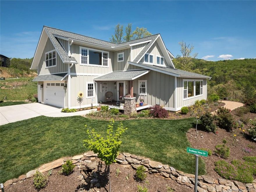 Custom home in the sought-after gated community of Starview Heights.This home features the master on main, HW floors throughout, granite countertops, Shaker style cabinets w/ soft-close drawers, Andersen windows, a vented gas fireplace, tankless H/W heater, solid wood doors & trim throughout, ample closet space, passive solar design, Brazilian hardwood decks, & stunning long range views!