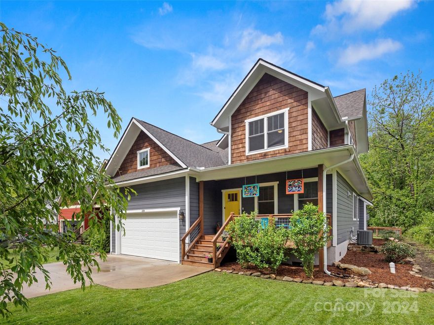 Modern farmhouse with high-end finishes throughout including hardwood floors, granite countertops, stainless steel appliances, tiled showers, walk-in closets and covered front and rear porches. Primary bedroom and attached bathroom are on the main level, as is the laundry and a guest bath. Two more bedrooms and a full bathroom upstairs. Listen to the creek from the covered porch adjacent to the fenced backyard. Convenient to the greenway and downtown Black Mountain.