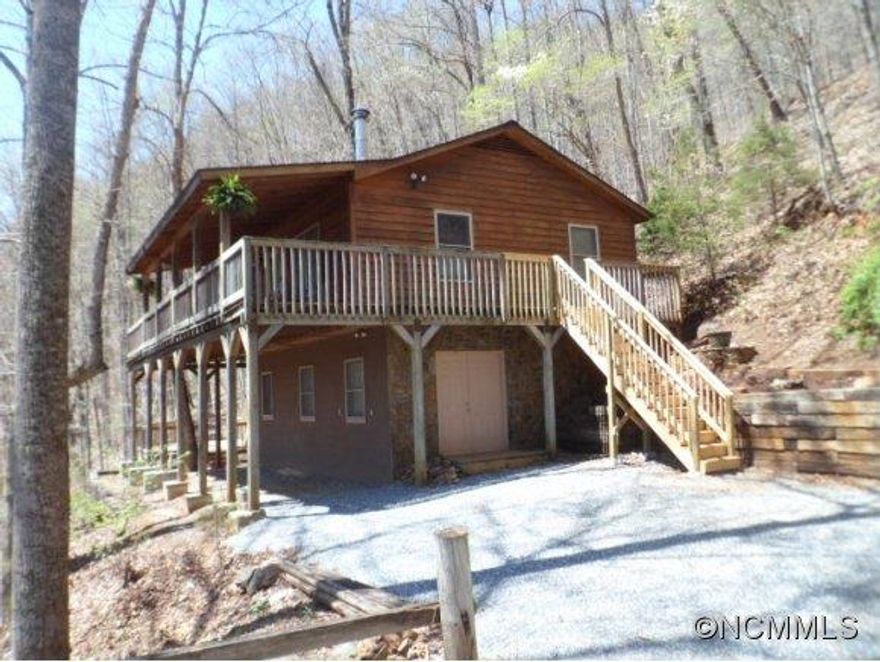 Long range views, large party deck, covered porch, wrap around deck and large screened in porch make this a great outdoor living getaway! this is a private 2 bedroom and 2 bath cute, cute, cute cabin in the woods. New shingles 2014, new steps 2014. Wood burning fireplace, master on the main w/claw foot tub and fully tastefully furnished! Would probably make a great vacation rental!