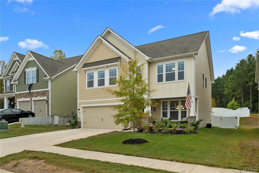 Looking for that new construction feel, but don't have time to wait?? Then check out this 3 bedroom 2.5 bath 2019 construction home with upgrades perfect for entertaining! From the front porch to the oversized extended back patio, there is so much to fall in love with. This home is complete with a formal dining room with wainscoting, white kitchen cabinets, tile backsplash, kitchen island, granite countertops, stainless steal appliances, heavy crown molding, fireplace in the living room and an added sunroom with plenty of windows to allow extra natural light into this open concept home. Upstairs you will find a loft area, the laundry room, two additional bedrooms, a spacious owner's suite with bathroom that includes his/hers vanity, large soaking tub, a walk-in shower and a large walk-in closet as well. If that wasn't enough, wait until you get to enjoy the large outdoor living space in your fenced in backyard. The community has a pool, walking trails, ballfields, and much ,much more!