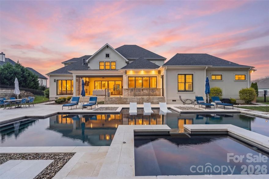 Welcome to Pinnacle Preserve, a private luxury retreat set on a pristine 1.2-acre homesite within the gated community of Pinnacle Ridge. Designed for those who appreciate architectural elegance and resort-level outdoor living, this extraordinary estate offers over 5,800 square feet of curated living space, seamlessly blending refined interiors with one of the most impressive backyard environments in the region.

From the moment you arrive, the home’s sophisticated design and manicured grounds set the tone for a residence built for both everyday comfort and elevated entertaining. Inside, a dramatic two-story foyer opens to expansive living spaces where an open-concept design connects the great room, dining area, and a stunning chef’s kitchen equipped with quartz countertops, a massive island, an eight-burner gas range, and a full-size dual door refrigerator. The space is designed to bring people together while maintaining the effortless flow expected in a luxury residence.

The main-level primary suite offers a tranquil retreat with a spa-inspired bath and an oversized custom walk-in closet. Additional bedrooms and living spaces provide flexibility for family, guests, or work-from-home needs, while the upper level features a spacious media and entertainment lounge perfect for movie nights, game days, or private relaxation.

Step outside and the home transforms into a true private resort.

The backyard is a masterclass in luxury outdoor living. At the center sits a spectacular custom resort-style pool and elevated spa with cascading waterfall, surrounded by expansive stone terraces designed for entertaining and relaxation. A dramatic Baja tanning ledge allows in-water lounge seating, creating the perfect setting for sun-soaked afternoons while overlooking the pool’s striking architectural design.

The outdoor experience continues with a fully equipped outdoor kitchen and grill station with stone countertops and bar seating, ideal for hosting gatherings that effortlessly transition from day to evening.

Overlooking the pool is a breathtaking vaulted outdoor living pavilion featuring a wood-inlaid ceiling, fireplace, mounted television, and motorized screens, creating a four-season outdoor living space that feels both luxurious and intimate.

Just beyond the main residence, a connected second living quarters / entertainment lounge offers incredible flexibility. Currently designed as a sophisticated cigar lounge and private entertainment space, this retreat includes a wet bar with built-in refrigerator, a full bathroom, dedicated storage, and an upper-level fitness room complete with a private sauna.

Additional highlights include five bedrooms and four and a half baths in the main residence, along with a separate entertainment quarters that offers an additional bedroom and full bathroom, ideal for guests or extended living. The property also features a two-car garage equipped with EV charging, professionally designed landscaping with integrated landscape lighting, expansive outdoor terraces designed for entertaining, and a private, serene setting surrounded by natural beauty.

Every detail of this estate has been thoughtfully curated to create an environment where luxury, privacy, and lifestyle converge. Whether hosting unforgettable gatherings beside the pool, relaxing under the covered pavilion by the fire, or enjoying the peaceful surroundings of this exclusive community, 788 Pinnacle Drive delivers a living experience that is truly exceptional.