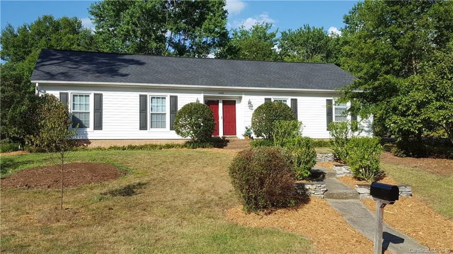 Ranch home on corner lot in Terrabrook within walking distance to pool. Subdivision is located off Carmel Rd and close to I-485, Pineville Matthews Rd, Johnston Rd and Park Rd.  Home has a 2 car carport, fenced in back yard, new vinyl siding, large deck and sunroom. Home has an open floor plan w/ hand scraped cherry floors in the living room, dining room, hallway & all three bedrooms.  Tile flooring in both bathrooms & kitchen.  New paint throughout and new range/oven in kitchen.