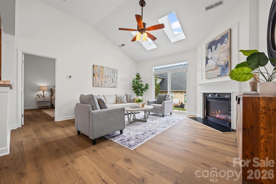 Discover this beautifully updated 3-bedroom, 2.5-bath end-unit townhome in Sedona at Stone Creek Ranch, offering exceptional value and a thoughtful blend of comfort, style, and convenience in desirable South Charlotte. As a coveted end unit, the home benefits from added privacy and abundant natural light, enhanced by skylights that fill the living space with sunshine and create a warm, welcoming atmosphere throughout the main level. Fresh paint and new wood laminate flooring provide a clean, modern look and make this home truly move-in ready. The open floor plan flows seamlessly into the kitchen, which features 42-inch cabinetry, generous storage, and practical workspace—well-suited for both everyday living and entertaining. The primary bedroom is conveniently located on the main level, offering a spacious walk-in closet, a private en-suite bath, and the added convenience of main-floor laundry. Upstairs, two additional bedrooms and a fully finished bonus room with new carpet provide flexible living space ideal for a home office, or media room. This versatile layout allows the home to adapt easily to a variety of needs, adding to its long-term livability and appeal. The HOA includes water and trash service, lawn maintenance, and access to the neighborhood pool, helping keep monthly expenses predictable while supporting a low-maintenance lifestyle. Ideally located just minutes from Rea Farms and Waverly, residents enjoy easy access to shopping, dining, and daily conveniences, along with quick connectivity to I-485 for commuting throughout the Charlotte area. With its recent updates, functional floor plan, desirable end-unit setting, and included community amenities, this home presents an excellent opportunity for buyers seeking comfort, convenience, and value in one of South Charlotte’s most accessible locations. Buyers are encouraged to check with their agent regarding available Down Payment Assistance Programs.