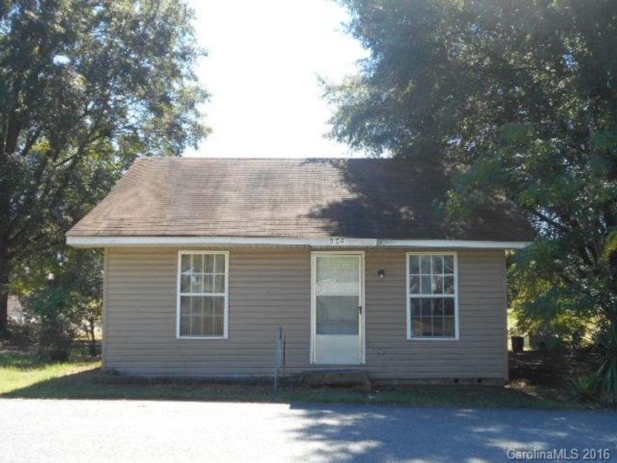 Charming home needs personal touch,  almost two acres. Great location close to shopping and highways.