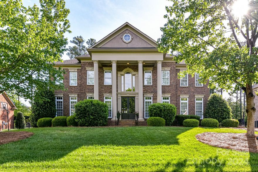 Spectacular Full Brick executive home w/ 3rd floor bonus and incredible private back yard located in the amenity rich neighborhood of BridgeMill. The double door entry welcomes all to this Whtney floorplan featuring high ceilings, gleaming hardwoods, a formal dining room & main floor guest en-suite w/ full bath. The Chef's kitchen w huge island and cabinets galore showcase the amazing counter space w/ tons of natural light. Relax on the back covered Patio with a private back yard oasis, beautiful trees and gorgeous landscaping. Spacious Owner's suite features Dual walk-in closets & spa bathroom w/ oversized shower, Jacuzzi tub & dual vanities. Huge 3rd floor bonus room w/ additional storage and 5th full bathroom. This highly social community w/resort-style amenities, clubhouse, two pools, a fitness center, tennis, basketball & volleyball courts and three pocket parks provides something for all.