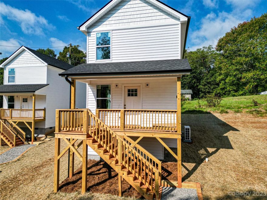 House is complete and move-in ready! 1 of 6 Homes coming in West Asheville. Brand new construction centrally located and convenient to everything Asheville has to offer. This efficient home makes the most of every square inch. Open floor plan bathed with warm natural light is perfect for entertaining. Luxury vinyl plank flooring, fabulous kitchen with stainless steel appliances, granite counters, spacious all-plywood soft close cabinets, under cabinet lighting, and the perfect kitchen island. Neutral colors make decorating a breeze. Well-priced, move-in ready and waiting to hold all of your fond memories or become your next charming retreat or sought after investment property. Tax value based on previous vacant land and does not represent current improvements