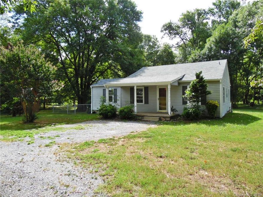 Calling all investors or handy buyers!  3 BR/1 BA ranch on an acre lot with spacious kitchen, large bedrooms, deck, fenced yard, and front porch.  Home is being sold as-is but has loads of potential.  Roof replaced in 2016.  HVAC will be replaced prior to closing.  Located near new Riverwalk Academy and 15 minutes to the interstate, beautiful Lake Wylie, and more!