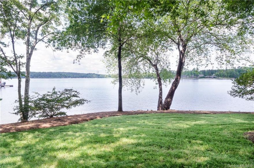 Fun in the sun awaits on the beautiful Allison Creek peninsula of Lake Wylie.  Waterfront with wide open views, area ideal for boating & watersports.  You'll love the nice, flat lot for easy access to the lake.  Cvrd dock with lift, large sunning deck, and lakeside storage with porch. Vintage lake home has wrap-around screened porch, detached 2-car garage with heated office space. Open kitchen/living area with cathedral ceilings and magnificent views of the water. Use for vacation or year round!