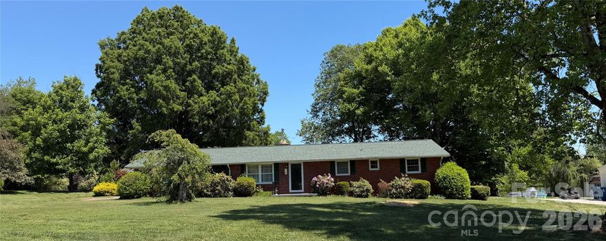 Large brick ranch located in the Terrace Lawn neighborhood. Home has 3 beds & 1 1/2 baths. Large spacious living room area that could be used as a living room and dining room or just large living area. Kitchen has an island that is perfect for bar stools for seating. Hard surface countertops in kitchen. There is a huge bonus room/entertainment room, that can be used for all your entertaining needs. The home has carpet, hardwoods & tile. The basement is partially finished with lots of storage area. It features interior & exterior entry. The is a 2 car attached garage and a 2 car detached garage. New roof & HVAC in 2023. Conveniently located close to Hwy 16, shopping, grocery stores &  restaurants. The large home has lots to offer. Schedule your showing today!!
