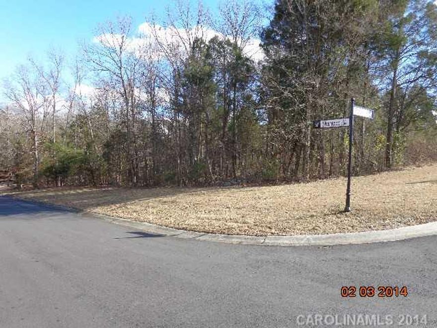 Beautiful building site on corner lot in the desirable town of Harrisburg. Excellent school system. This is two lots being sold as one unit.