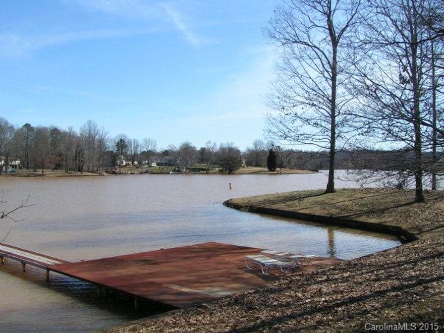 ENJOY THE PANORAMIC VIEW FROM ONE OF THE LAST WATERFRONT MOSS LAKE LOTS. SLIGHTLY SLOPING, WOODED. COUNTY WATER AVAILABLE, SEPTIC REQUIRED. KESTER FARMS RESTRICTIONS APPLY.