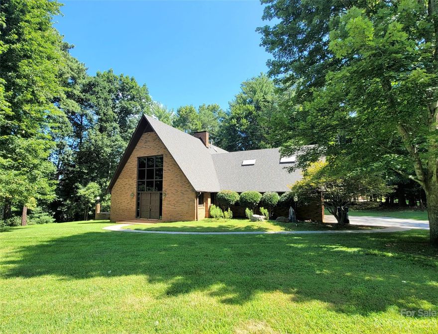 Groovy and gorgeous 3BR, 2BA brick contemporary home on 1.2 acre corner lot in the La Foret subdivision. All new luxury vinyl plank flooring throughout. Large 23.5' x 23.5' Living Room has soaring, beamed ceilings, recessed perimeter lighting, two-story fireplace, and custom power solar heat-reducing blind. Roof, dual fuel HVAC, and water heater were installed in 2019. Updated kitchen with granite and stainless appliances. Cubby/Office entryway from garage and Bonus Room above garage. Brick terrace opens to in ground pool (never opened/used by Seller) and is surrounded by lovely pierced brick privacy fence and brick pool house. Garage is heated and cooled. Custom blinds for other windows will stay for new owners to install.