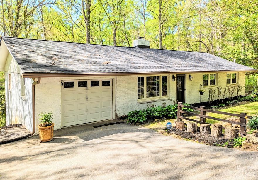 Lovely & Convenient 3 Bed/2 Bath Brick Ranch with Attached Garage - Only 8 Minutes to Downtown Hendersonville - Close to Restaurants, Shopping, Great Golf & Hospital Care.  Bamboo Hardwoods, Primary Bedroom Suite, Living, Dining, Kitchen and 2 Additional Bedrooms all located on the Main Level. Large Partially Finished Walk-Out Basement with Beautiful yard, Flower Garden and Private Wooded Sanctuary off the Kitchen, Dining & Rear Deck.  Enjoy Hiking, Biking, Kayaking, Entertainment, Flat Rock Playhouse, Chimney Rock State Park, Lake Lure, Biltmore House, Asheville, the Blue Ridge Parkway & So Much More!