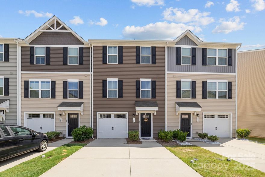 Looking for a great place to call home? Look no further! This conveniently located Fort Mill townhome offers 3 bedrooms, 2.5 baths, and a single extra-long garage, making it a perfect blend of comfort and functionality.
The dream kitchen boasts timeless white cabinetry, stainless steel appliances, gleaming granite countertops, and an additional island, perfect for entertaining and everyday living. Flowing seamlessly into the living room and dining area, you'll always feel connected with family and friends.
Upstairs, the primary suite provides a private retreat, while two additional bedrooms offer separation and privacy on the third level. Need a dedicated space for work, play, or exercise? A versatile flex room, conveniently located off the garage entry, awaits your personal touch.
Outside, enjoy a cozy fenced in patio.
This Fort Mill gem offers the perfect combination of modern amenities, flexible living spaces, and outdoor enjoyment.