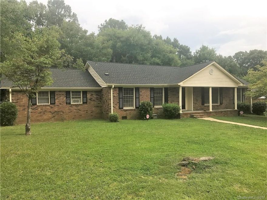 Brick 3 bedroom/2 bath ranch w/2-car back load garage, located on corner lot w/fencing.  Features include; beautifully updated and appointed kitchen w/new cabinets, granite & backsplash, stainless appliances; living room, dining room, & family room w/fireplace; spacious garage w/storage area,    Convenient to shopping, schools, lake, and access to 77.  Storage unit, playset, and all items in backyard do not convey.   Buyer/Agent to verify all info in decision process