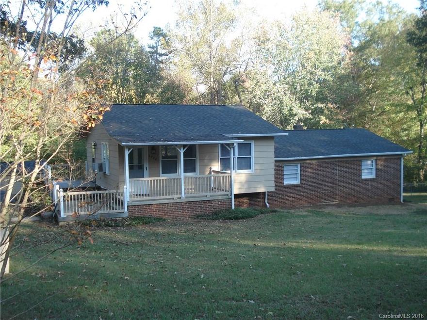 REDUCED!! Motivated Seller, Bring your offer Remolded Home w/ Brick & Wood Siding, 3 Bedrooms sitting on a 3.31 acre lot, with Basement workshop, Refrigerator, Washer and Dryer to remain, Many other new updates such as Newer Stove, updated Septic in 2014, New Bathroom fixtures and Tile around tub, Storage Shed only 2 years old to convey, Fenced in yard, wall paneling removed and replaced with dry wall through out the home. Seller motivated!!!!