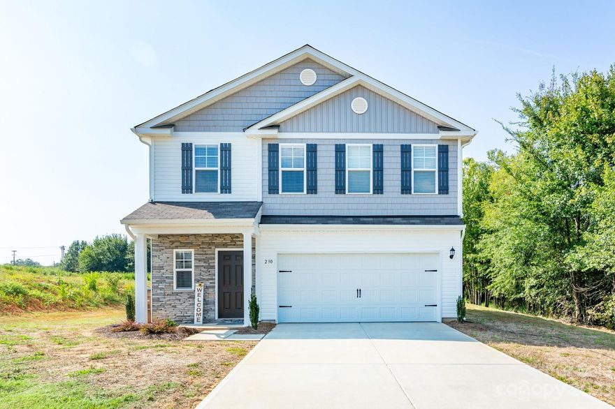 Looking for the perfect Move in Ready barely lived in home? Looking for a quick close? Look no further! This stunning home boasts 2013 sq ft with 4 spacious bedrooms and gorgeous LVP floors throughout the main level. As you walk in, you are met with a spacious foyer that seamlessly flows into the adjoining kitchen, dining and great room areas, perfect for entertaining friends. The convenient upper level large laundry room is perfect. The primary bedroom features vaulted ceilings and a large walk-in closet. The kitchen is a chef's dream with granite counters, stainless steel appliances, a subway tile backsplash, and a kitchen island with breakfast bar. The garage features upgraded epoxy floor protectant and garage shelves, perfect for all your storage needs. 2" Blinds on all windows. The lot to the right will not be developed as it is designated as common open space/greenway access. Don't miss out on this amazing opportunity to make this stunning house your home!