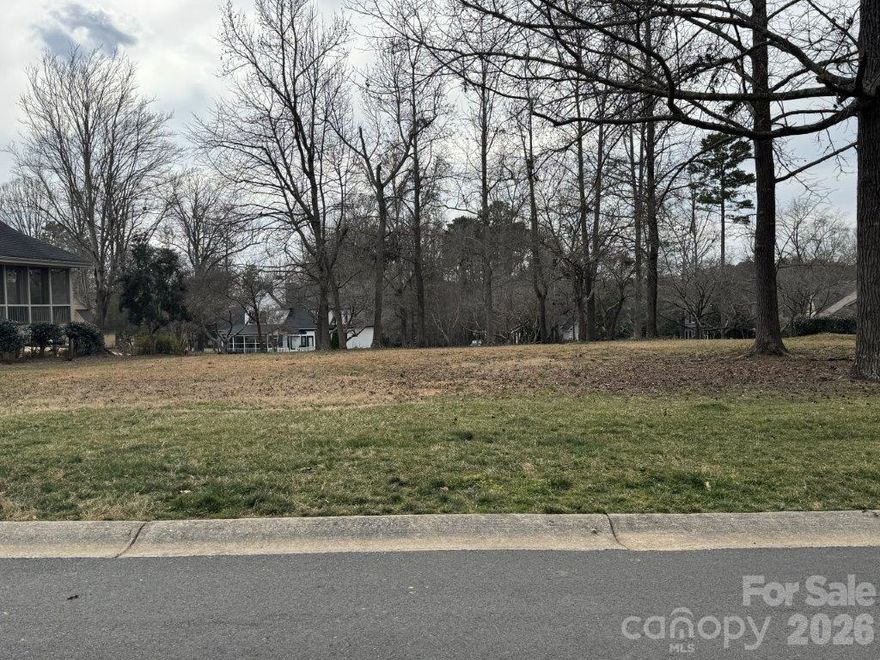 Beautiful homesite in the Millingport neighborhood of Old North State Club's gated community! Build your dream home and enjoy exceptional views & the convenience of the putting green in the back. The lot is an easy walk to Old North State Club amenities. Become a member of the Club for access to its recently renovated championship golf course, dining, pools, tennis/pickleball courts & more.