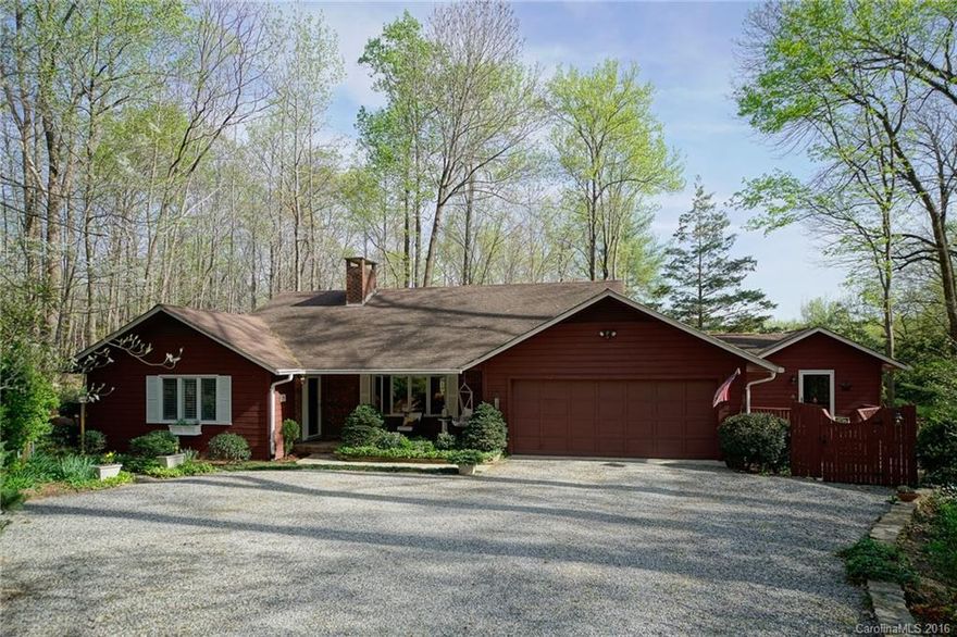 Live in a park like setting! Nestled on 2 beautiful acres with stream & mountain view, on a scenic private lane just 3 minutes to town. All on one level, featuring a covered flagstone porch and entry hall, spacious living room w/brick fireplace and built-ins, light and sunny kitchen & dining room w/French doors to new deck. 2 spacious master BR suites, updated baths, library/den & studio/office or 3rd BR w/separate entrance w/deck, sink, refrigerator, etc. Oversized 2 car garage.