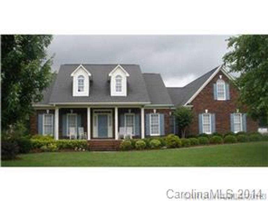 Custom all brick home in Stallings Farm. No HOA fees.; community protected by Covenants that run with the deed. Half-round windows, transom window above front door, extra long driveway, large finished double garage, extensive decorative molding, fruit and flowering trees, gazebo with prolific muscadine grape vines, partially floored attic with 4 doors for access. Home warranty included.