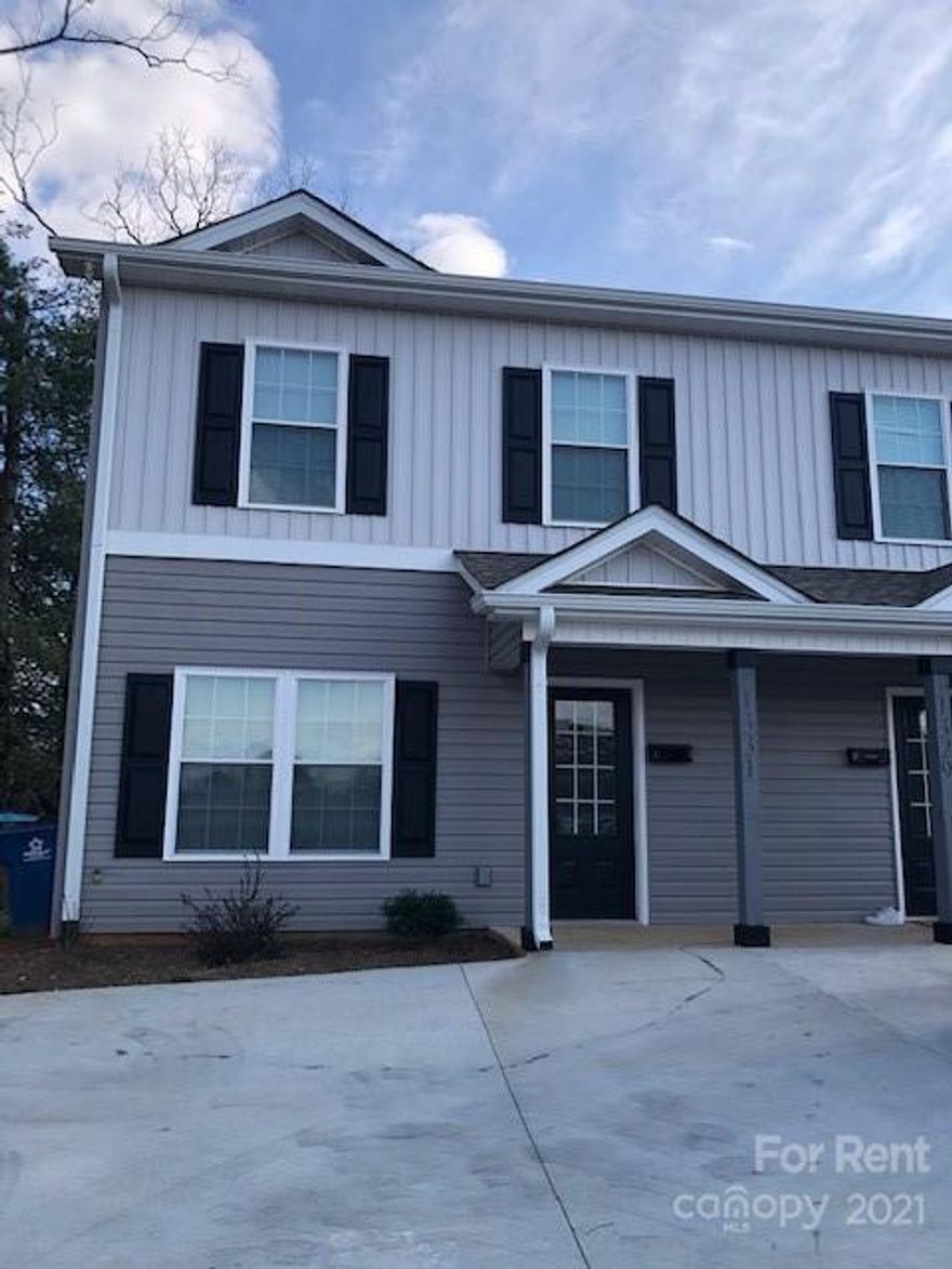 3 bedroom, 2.5 bath home built in 2021! Open layout with hardwoods throughout first floor, half bath, kitchen has granite counter tops, kitchen island, back patio with screen slider for cooler day, with a fence partition for privacy from neighbor. Upstairs features 2 bedrooms that share a hall bath, laundry room with washer/dryer included, and a primary bedroom with its own walk in closet and bathroom. Available for immediate move in.