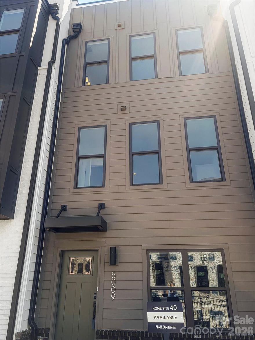 Experience modern luxury in the heart of LoSo, one of Charlotte’s fastest-growing areas. This brand-new, move-in ready Dunbrook floorplan townhome, tucked back into the community, offers 3 bedrooms, 3.5 baths, and a 2-car garage—with a private en-suite bath in every bedroom, ideal for roommates or guests.

Designed for seamless indoor-outdoor living, the open-concept main level extends from the Great Room to a outdoor living area, while the rooftop terrace provides an elevated space for entertaining or unwinding. The designer kitchen features quartz countertops, soft-close cabinetry, and a spacious island, complemented by hardwood stairs and luxury vinyl plank flooring throughout the main living areas and fourth-floor bedroom.

Additional highlights include durable Hardie Plank siding, crown molding, zoned thermostats for enhanced comfort, and abundant natural light throughout.

Located just two blocks from the LYNX Blue Line at Scaleybark Station, with quick access to South End’s dining, breweries, and Uptown.

Limited-time financing incentives available—contact agent for details.