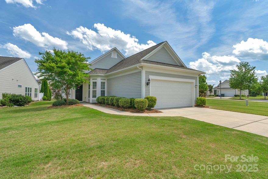 Beautiful 1,404-square-foot patio home in Sun City Carolina Lakes offers the perfect blend of style, comfort & low-maintenance living. Designed w/a desirable split-bedroom layout, it features 2 bedrooms & 2 full baths w/elegant granite countertops. Need a home office, hobby room, or quiet reading nook? The dedicated flex space w/classic French doors offers endless possibilities. The spacious, eat-in kitchen is highlighted by a cozy bay window, high-end white staggered cabinetry, gleaming granite counters, pantry, & convenient laundry access just steps from the attached 2-car garage. Step outside & savor the mild Carolina weather on your serene, screened porch or entertain guests on the paver patio. Inside, custom plantation shutters grace most windows, and rich wood floors flow through the kitchen, dining, and living areas, adding warmth and charm throughout. This is more than a home—it's a lifestyle. Come see why so many love living in Sun City Carolina Lakes!