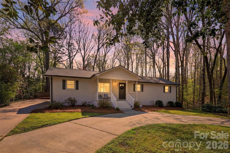 Welcome to 6017 Caroline Dr, Matthews! This charming 3 bedroom, 2 bathroom full brick home offers 1,853 sqft of living space and sits on a spacious .48-acre lot with a fully fenced yard, perfect for outdoor activities and privacy. A convenient circle driveway adds to the home's curb appeal and makes parking a breeze. Inside, you'll love the vaulted ceilings in both the kitchen and primary bedroom, creating a bright, open atmosphere. The versatile bonus room provides additional space that can easily be used as a 4th bedroom or a home office. Enjoy the benefits of Union County taxes and top-rated Weddington schools. Recent upgrades include a brand-new HVAC system (2024) and a new roof (2025), ensuring peace of mind for years to come. Move-in ready and waiting for you to call it home!