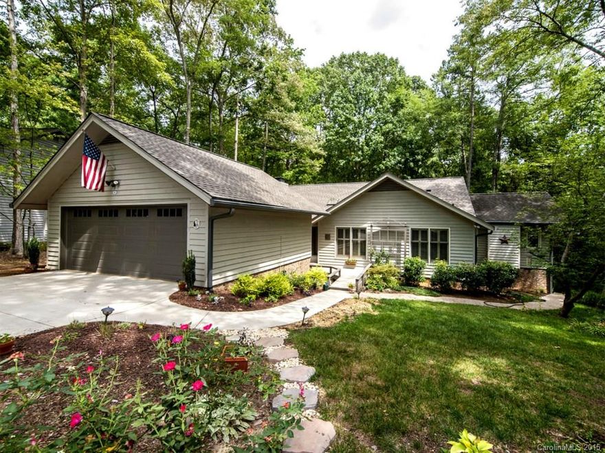 Spectacular home in River Hills located in a cul de sac with seasonal views of Lake Wylie/ 3 bedrooms on the main level including master & ensuite bath/separate shower/soaking tub.  Gourmet Thermidor kitchen opens to keeping room. 4 gas fireplaces. Downstairs bedroom, wine cellar, sauna and workout room. Walk up attic. Multigenerational potential/ separate entrance to lower level rooms.  New decking/gas fire pit. Open concept home perfect for entertaining. Hardwoods on most of main level. WOW!