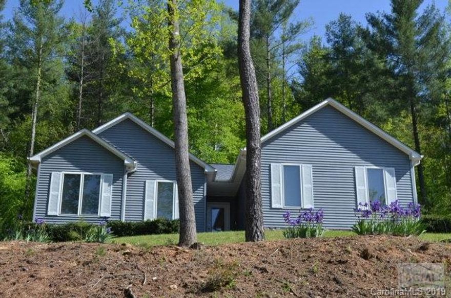 A notch above the rest, this 3BR/2BA home in River Glen boasts many quality upgrades:  Oversized Master bedroom, ceramic tile Master bath shower, maple floors in living/dining/kitchen, wood burning stone fireplace, stainless appliances and gas range, ceiling fans, higher quality vinyl siding, decorative exterior stone work, casement windows, exterior lighting. One level living with open floor plan. Dining table and chairs and deck furniture stay.<p>Home has Morganton mailing address, but is located in Glen Alpine town limits.   Glen Alpine provides road maintenance and garbage pickup. City of Morganton provides water and sewer.