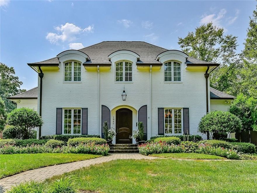 Elegant custom brick home w/incredible floor plan. Private owner's suite on main w/gorgeous bath. Well appointed gourmet kitchen w/ two farm sinks, granite countertops & banquette.Oversized garage.10 Foot ceilings down,wide plank hardwood floorings, Butler's pantry. Bonus room upstairs.Garage apartment w/full kitchen & full bath. Amazing private outdoor living space w/ covered brick porch &fireplace, perfect for entertaining.Exquisite interiors w/designer lighting, chandeliers & custom curtains.