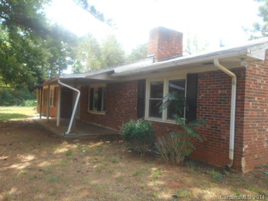 All brick ranch home nestled among huge pine trees on a 2 acre lot!  Full unfinished basement, 3 bedrooms and 2 baths!  This is a Fannie Mae property