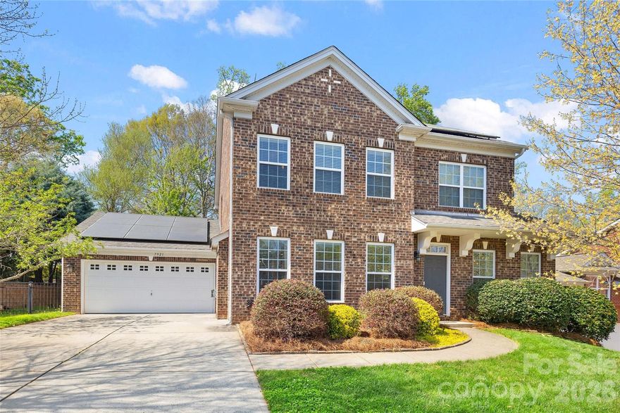Handsome brick home nestled on a quiet cul-de-sac street in popular South Charlotte! This light-filled floorplan offers 4BR, 2.5BA, and 2,600+ sq/ft of comfortable living space with an open, inviting layout. Beautiful hardwoods throughout the main level. Formal dining room (currently used as an office) and a welcoming living room with gas log fireplace provide flexible living and entertaining spaces. The kitchen is equipped with granite countertops, breakfast bar, center island, stainless steel appliances, pantry, and opens to a sunny breakfast area. The main-level primary suite features a spacious walk-in closet and en-suite bath with dual vanity, glass walk-in shower, and garden tub. Laundry room/drop zone with built-in storage and attached 2-car garage with workshop add everyday convenience. Upstairs includes 3 spacious secondary bedrooms, a full bath with dual vanity, and a loft/bonus room. Enjoy outdoor living with mature landscaping, covered deck, sunny patio, and built-in grilling station with gas grill—plus a flat yard and additional cleared natural space. Outfitted with solar panels, offering improved energy efficiency and reduced utility costs. Just minutes from McAlpine Creek Greenway and convenient to SouthPark, this move-in ready home checks all the boxes!