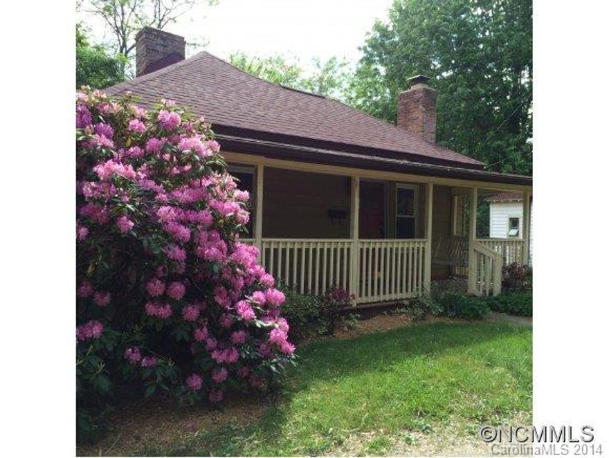 CHARMING HISTORICAL MONTFORD BUNGALOW! Open & bright. JUST MINUTES from everything dwntwn AVL has to offer! Conveniently nestled off Courtland Ave. New roof & appliances in '09. Furnace less than 3 years old! FANTASTIC covered porch-the swing CONVEYS! Orig. 1915 character intact but w/wonderful updates including a gas log fireplace, hand-crafted wood countertop in kitchen & MORE! Unfinished basement perfect for your workshop or just for storage.