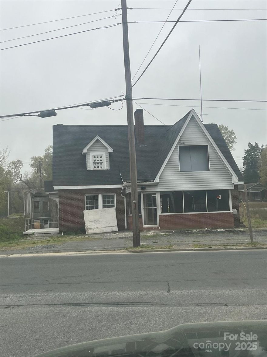 Here is a blank slate waiting for you in Albemarle!  The property was formerly zoned GHB and had been converted into commercial and apartment use.   It has recently been rezoned RO which allows residential or office use in the space.  The building has been gutted and is ready to be repurposed.  The City is in the process of approving proposed plans for a quadplex.