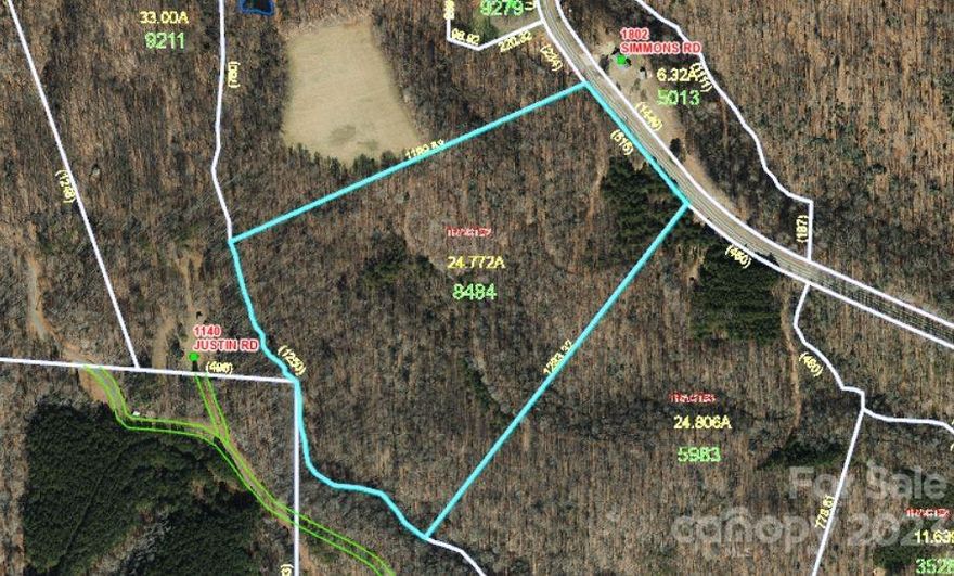 Beautiful 24.77 acre wooded unrestricted land parcel in Stokes County. Potential build sites exist all across this rolling property both near the road and by the creek. Views of Hanging Rock Mountain from the road. Ready for your dream home or small farm.